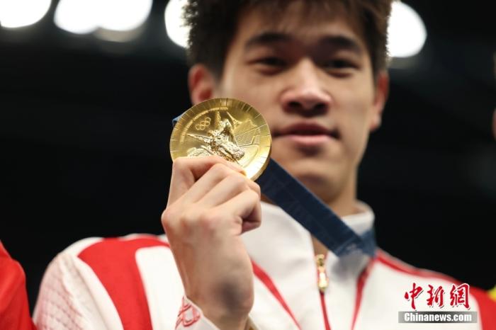 潘展乐：嘲讽与欢呼在水下无声，靠信念与团队